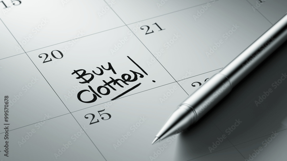 Closeup of a personal agenda setting an important date written w Closeup of a personal agenda setting an important date written w