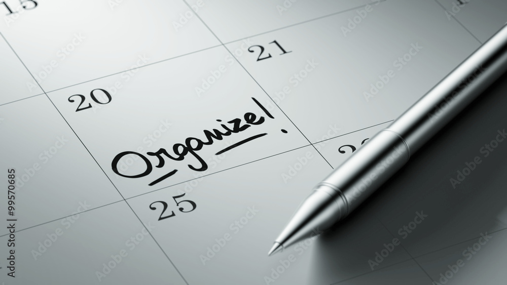 Closeup of a personal agenda setting an important date written w Closeup of a personal agenda setting an important date written w