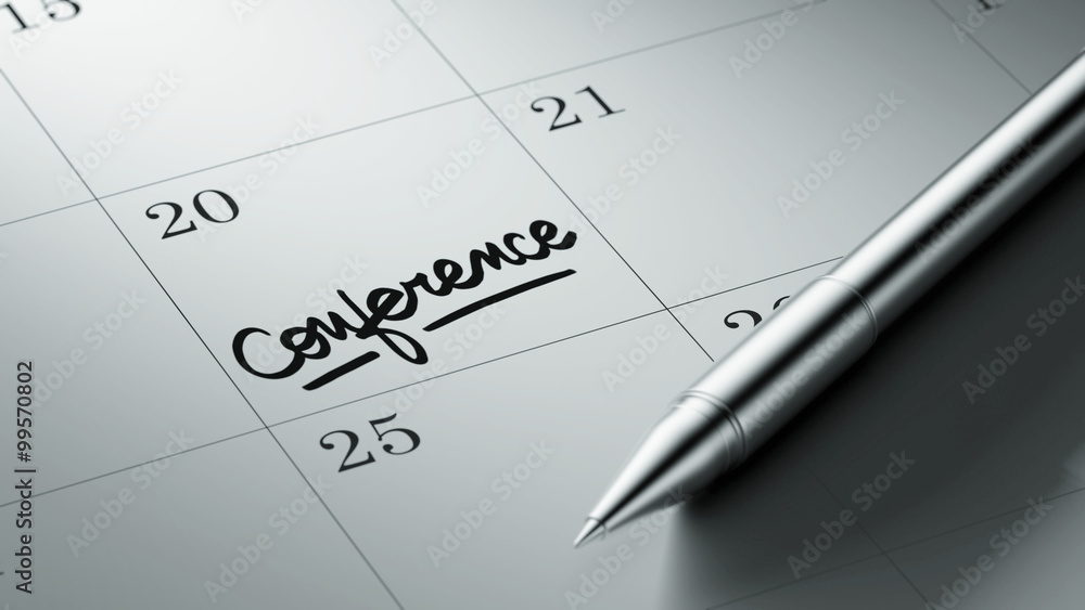 Closeup of a personal agenda setting an important date written w Closeup of a personal agenda setting an important date written w