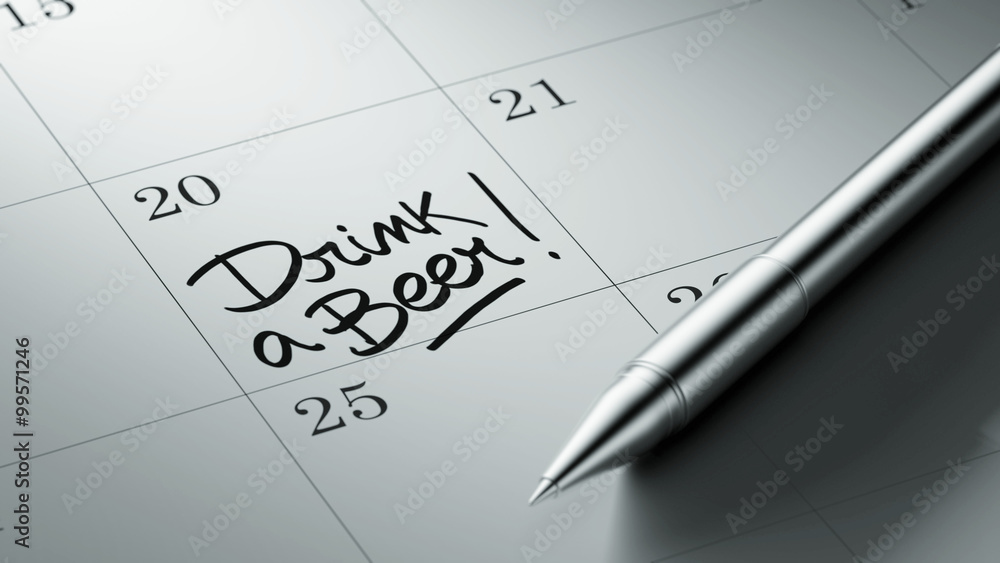 Closeup of a personal agenda setting an important date written w Closeup of a personal agenda setting an important date written w