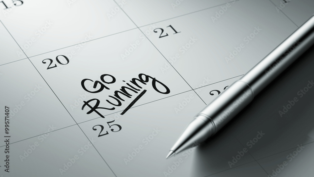 Closeup of a personal agenda setting an important date written w Closeup of a personal agenda setting an important date written w