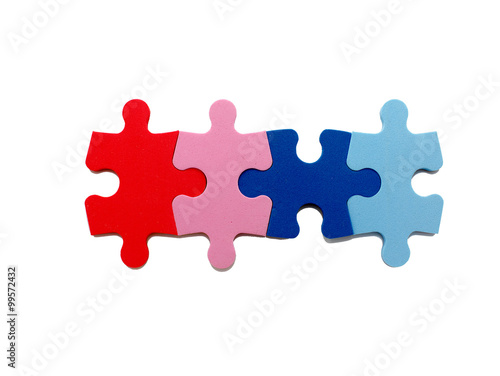concept of open marriage. Four puzzle pieces of different colors symbolize an open relationship in marriage, sexual relations with different partners. isolated on white background