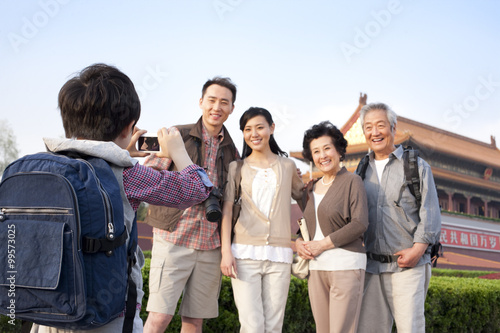Photography Happy family travelling at Tiananmen Square in Beijing, China