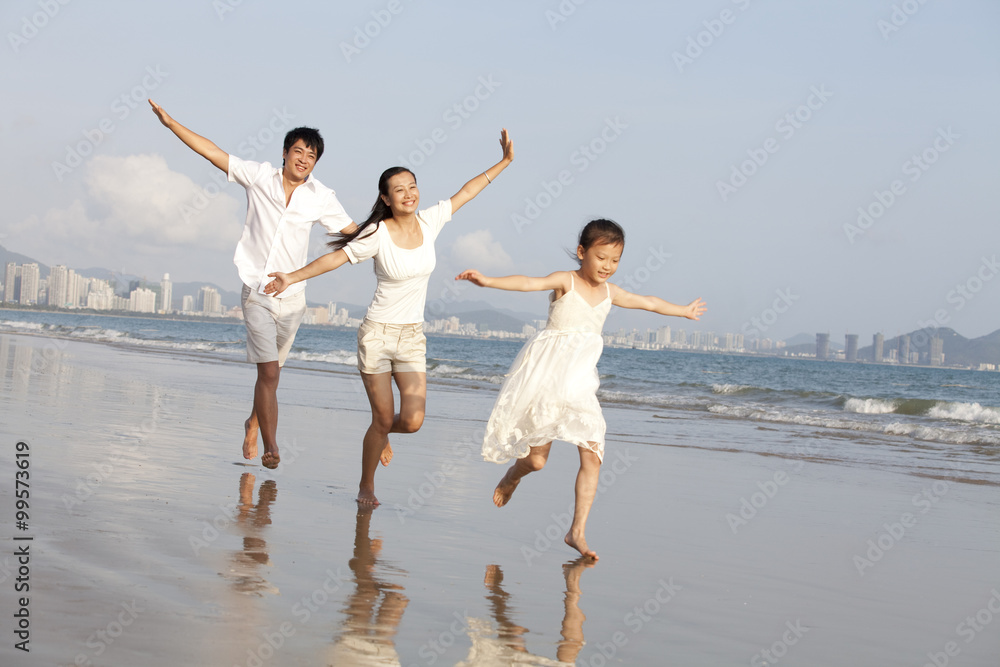 Portrait of a family walking on the beach Portrait of a family walking on the beach