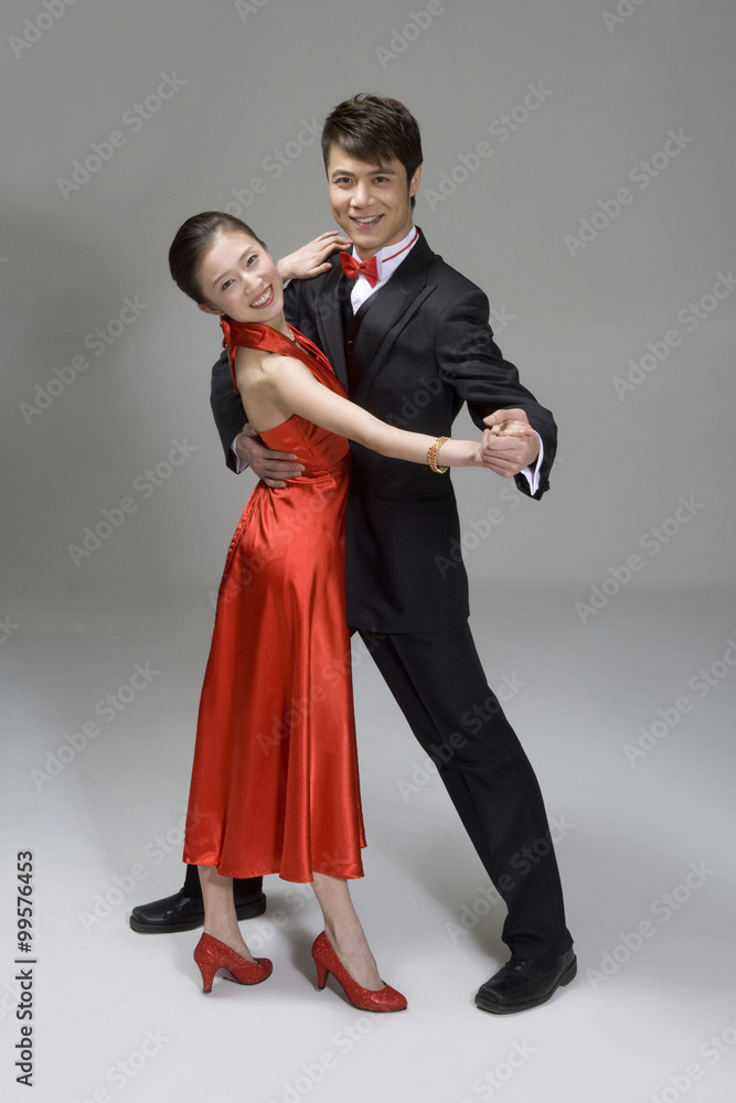 Young couple ballroom dancing
