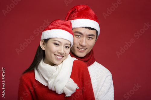 Young couple celebrating Christmas