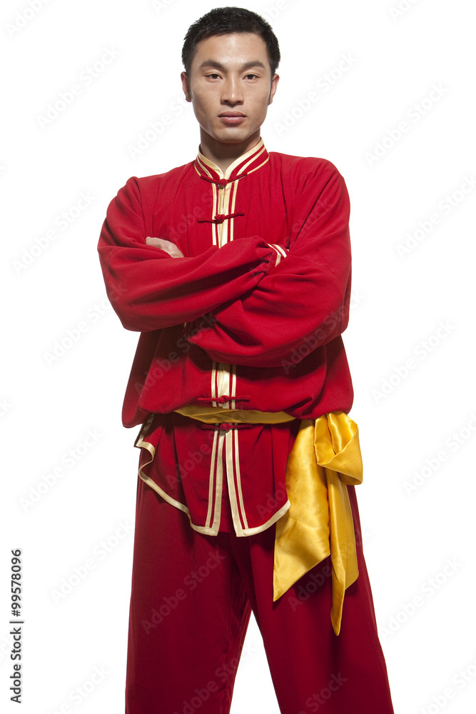 Focused Man Doing Martial Arts in Chinese Clothing Focused Man Doing Martial Arts in Chinese Clothing