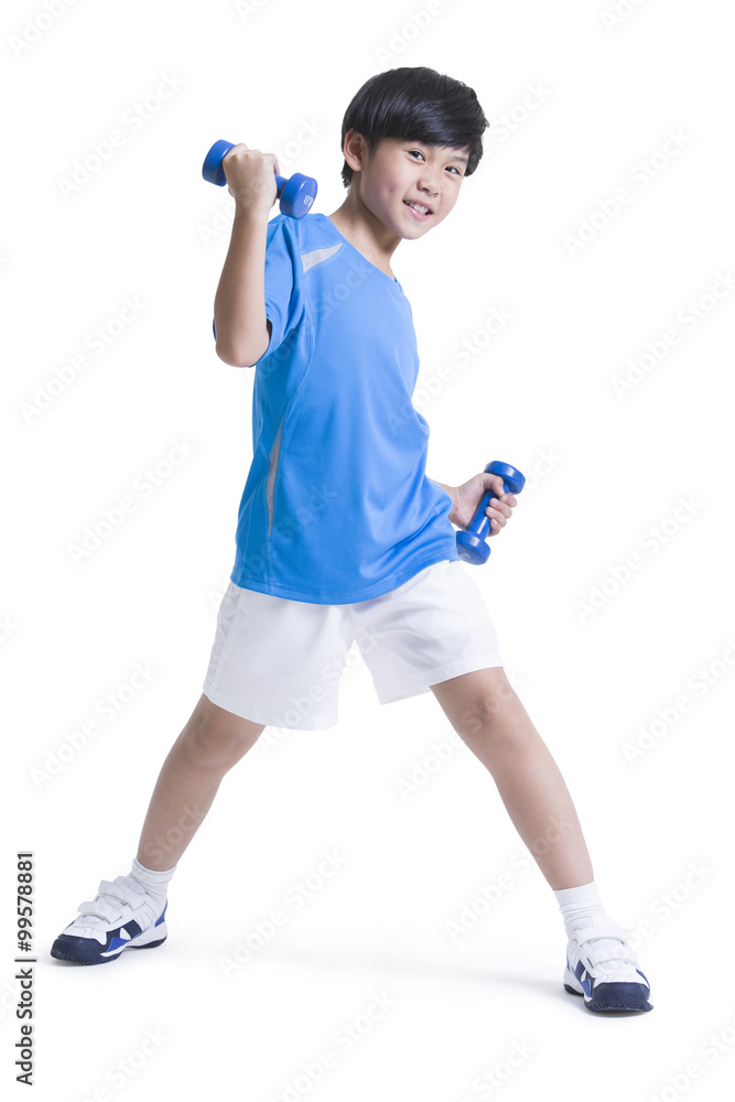 Happy boy with dumbbells exercising Happy boy with dumbbells exercising