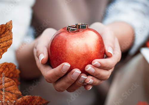 wedding rings on the apple