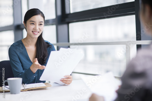 Young businesswoman conducting job interview