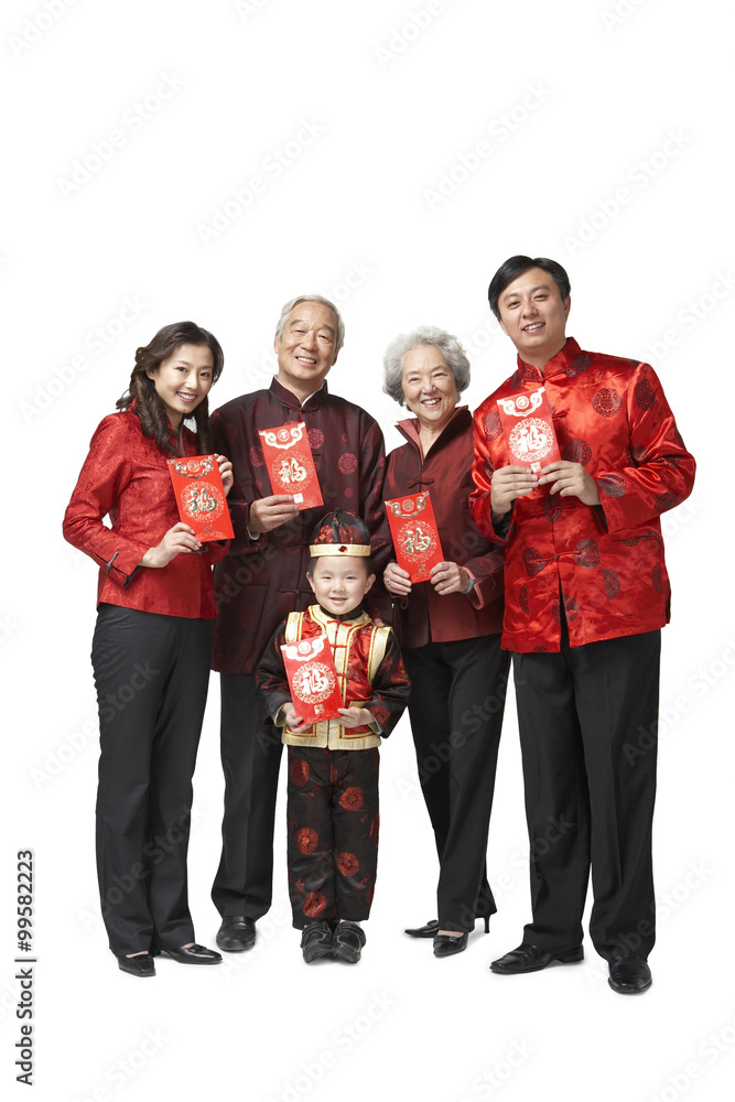A three generational family dressed for Chinese New Year holding red envelopes A three generational family dressed for Chinese New Year holding red envelopes