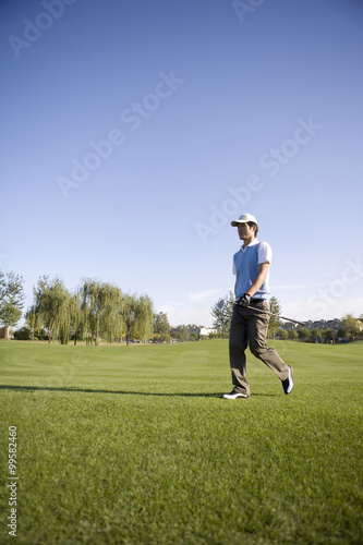 Man walking on golf course