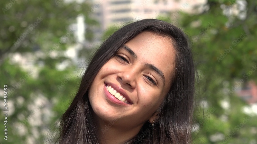 Smiling Teen Hispanic Girl during Summer Smiling Teen Hispanic Girl during Summer