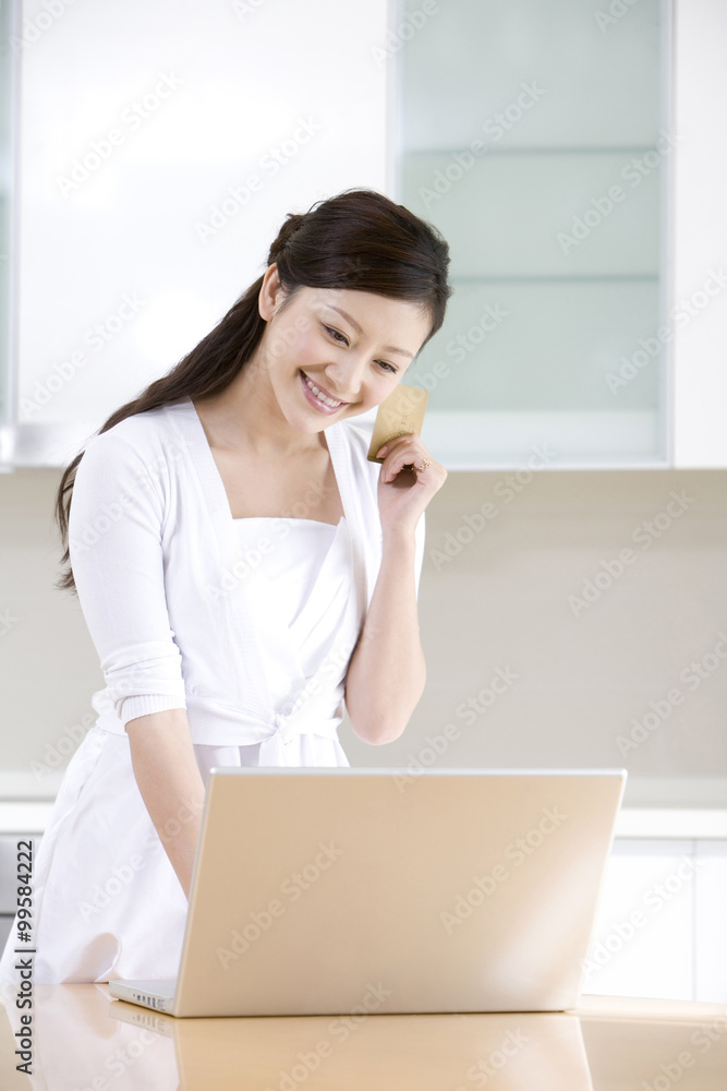 Young woman internet shopping from home Young woman internet shopping from home