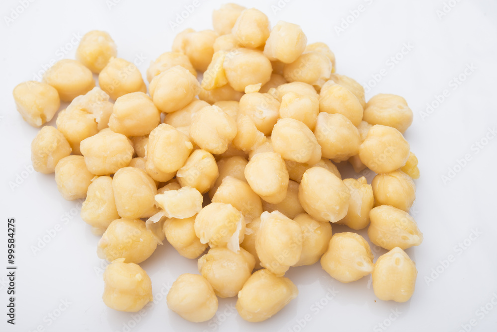 Pile of chickpeas against white background Pile of chickpeas against white background