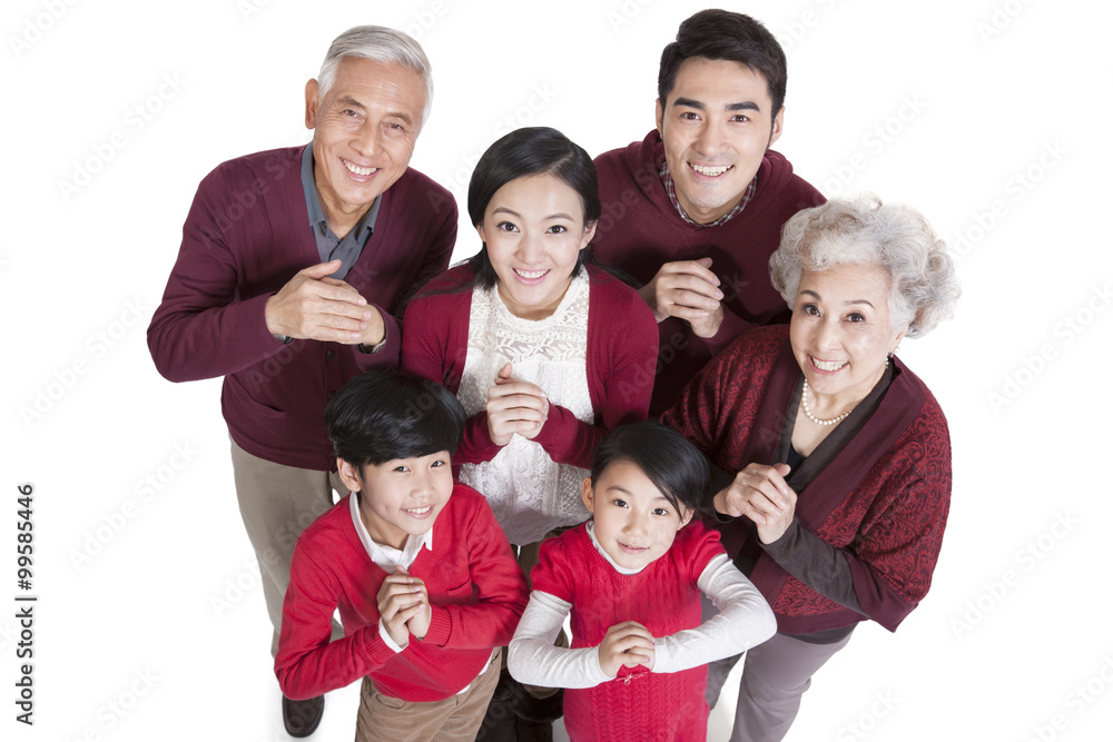 Cheerful family celebrating for Chinese New Year Cheerful family celebrating for Chinese New Year