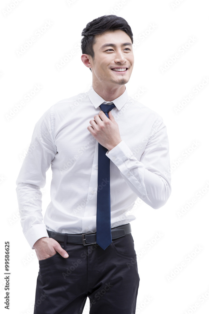 Fashionable businessman adjusting neckline Fashionable businessman adjusting neckline