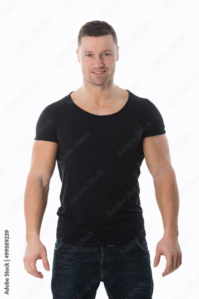 Handsome Man In Casuals Standing With Hands In Pockets Handsome Man In Casuals Standing With Hands In Pockets