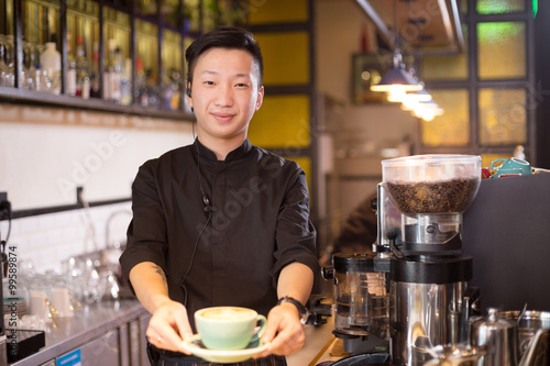 waiter serving in cafe