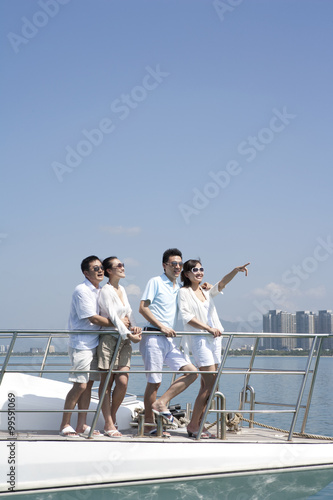 Friends Having Fun on a Yacht © Blue Jean Images