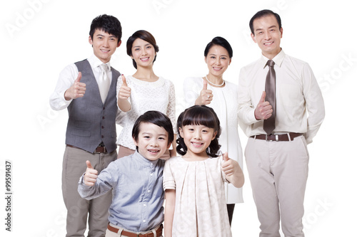 Cheerful family doing thumbs up