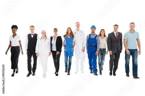 Confident People With Various Occupations Walking In Row