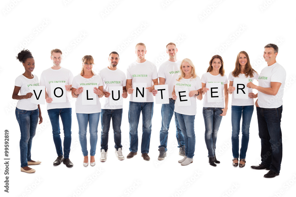 Portrait Of Confident Volunteers Holding Blank Placards Portrait Of Confident Volunteers Holding Blank Placards