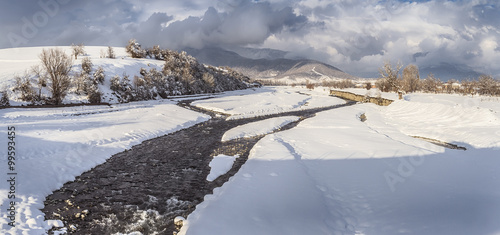 Wallpaper Mural GEORGIA. KAKHETI. LAGODEKHI. River Kabali. JANUARY 2, 2016. Winter, horizontal landscape. Floodplain and mountains are covered with snow. Torontodigital.ca