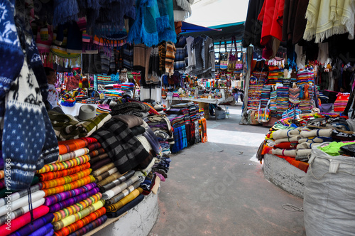 Colorful Sunday market in Otavalo, Ecuador photo