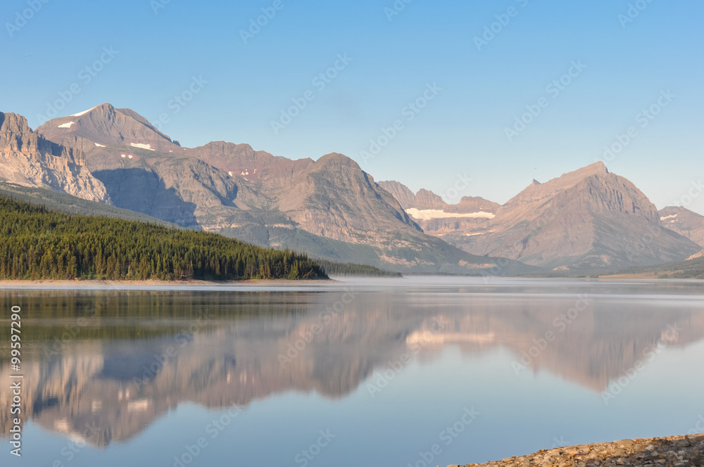 Reflective mountains in Glacier National Park, Montana, USA