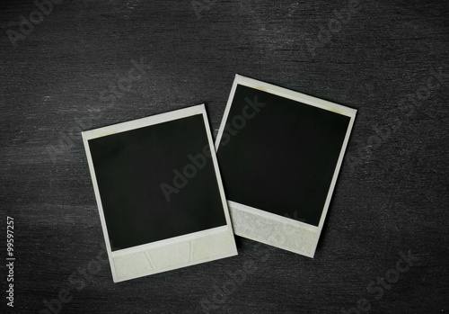 Photo frame of polaroid on black background.