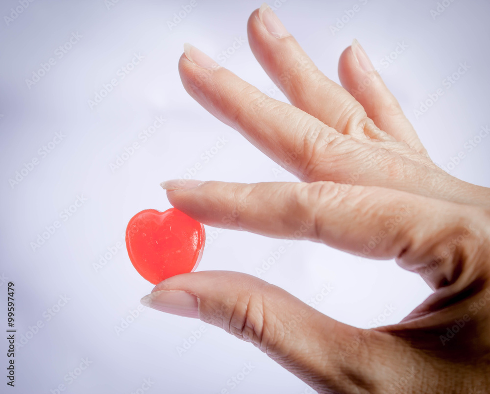hand hold red heart candy hand hold red heart candy