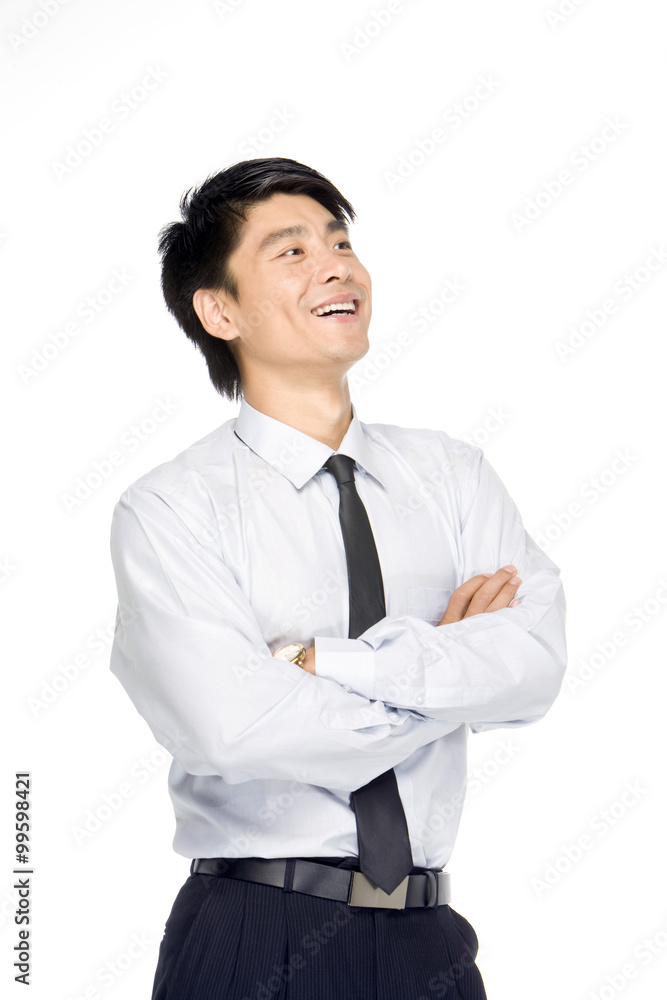 Portrait of young Businessman, arms crossed