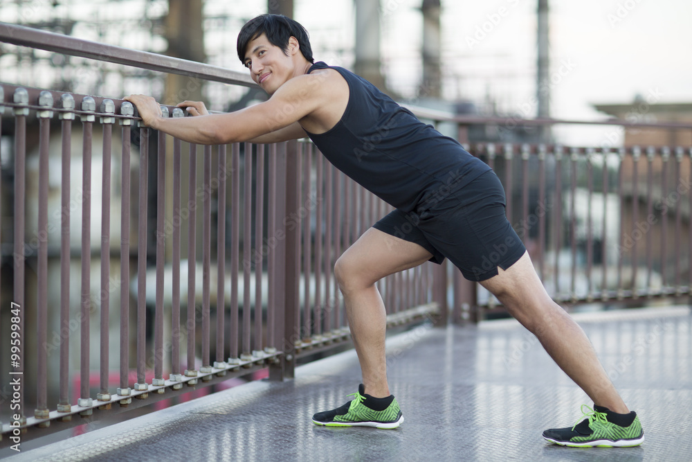 Fototapeta premium Young man exercising outdoors