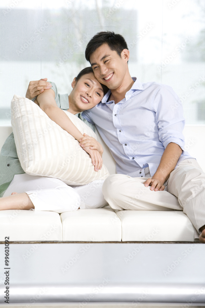 Portrait of a couple relaxing on the couch