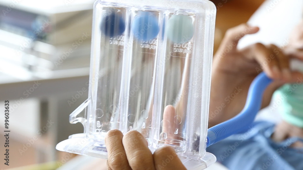 Blowing out three balls Incentive Spirometer for deep breathing after