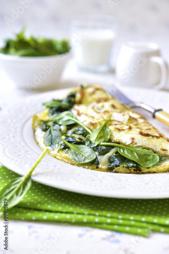Omelette stuffed with spinach and cheese.