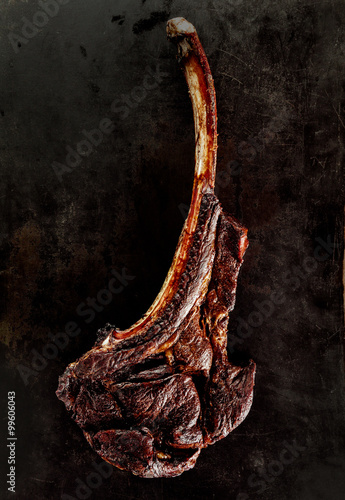 Grilled or barbecued tomahawk steak