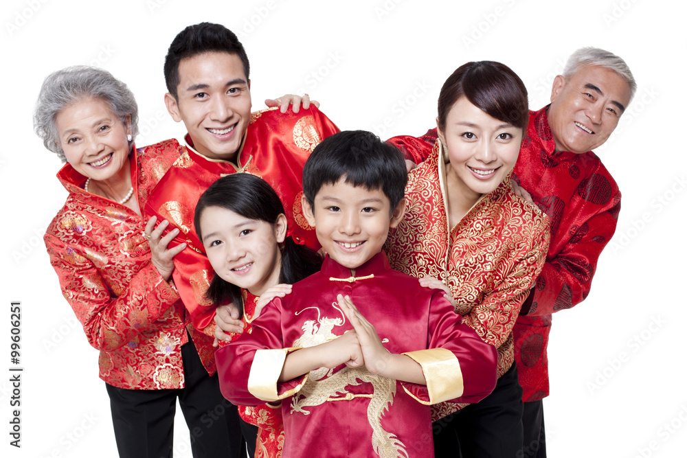 Family Dressed in Traditional Clothing Celebrating Chinese New Year Family Dressed in Traditional Clothing Celebrating Chinese New Year