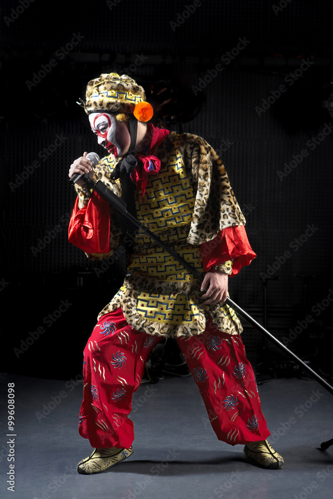 Obraz premium Man In Ceremonial Costume With Microphone