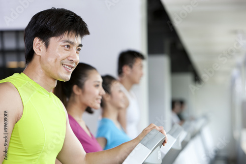 Free Download Mid-Adult Man Running on Treadmill - GFXLoad