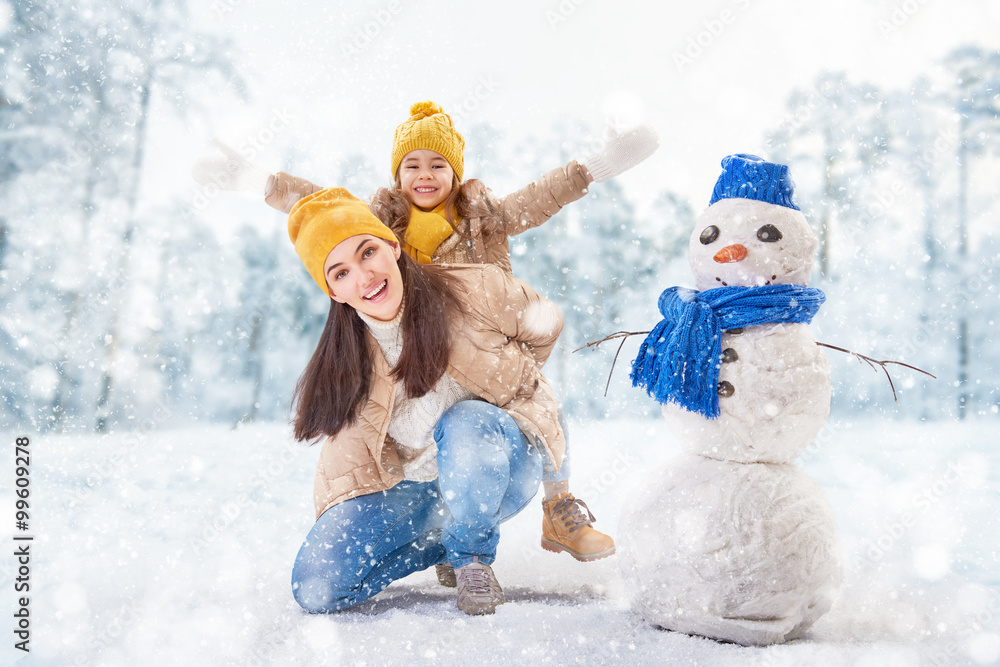 Mother and child girl on a winter walk Mother and child girl on a winter walk
