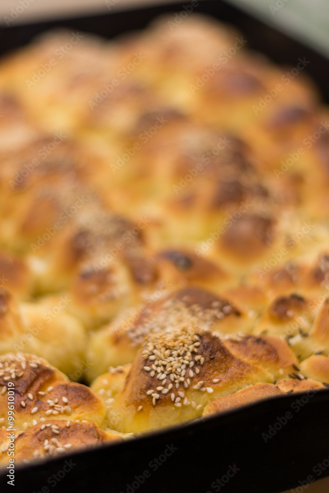 Fresh and hot baked rolls on the plate Fresh and hot baked rolls on the plate