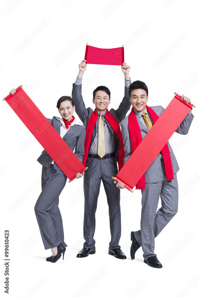 Cheerful business people with couplets celebrating Chinese New Year Cheerful business people with couplets celebrating Chinese New Year