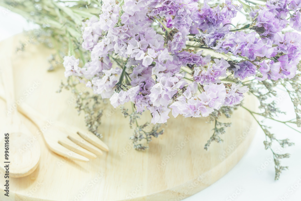 Wooden set of food utensil and static flower Wooden set of food utensil and static flower