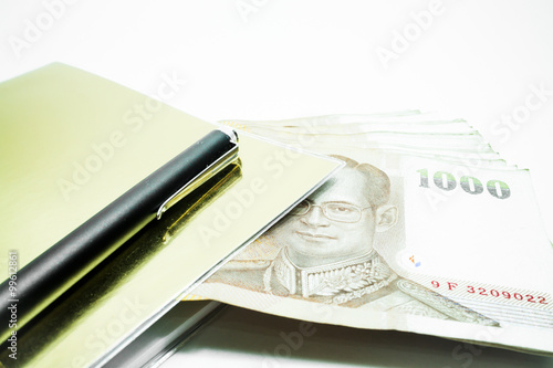 Wallpaper Mural Thailand banknotes arranged in set and  note book Torontodigital.ca