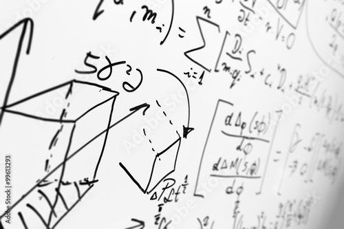 Complex math formulas on whiteboard. Mathematics and science with economics