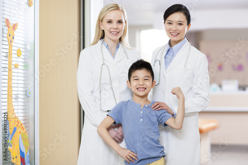 Doctors and boy in children s hospital