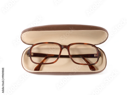 Brown glasses on isolated white background