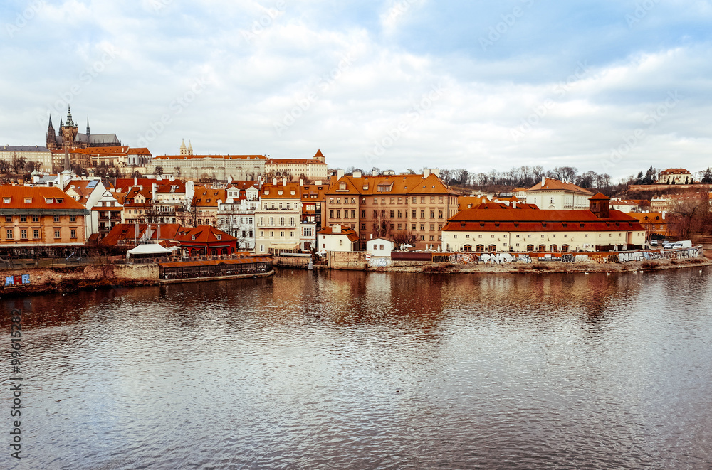 Old Town ancient architecture and river pier in Prague, Czech Re Old Town ancient architecture and river pier in Prague, Czech Re